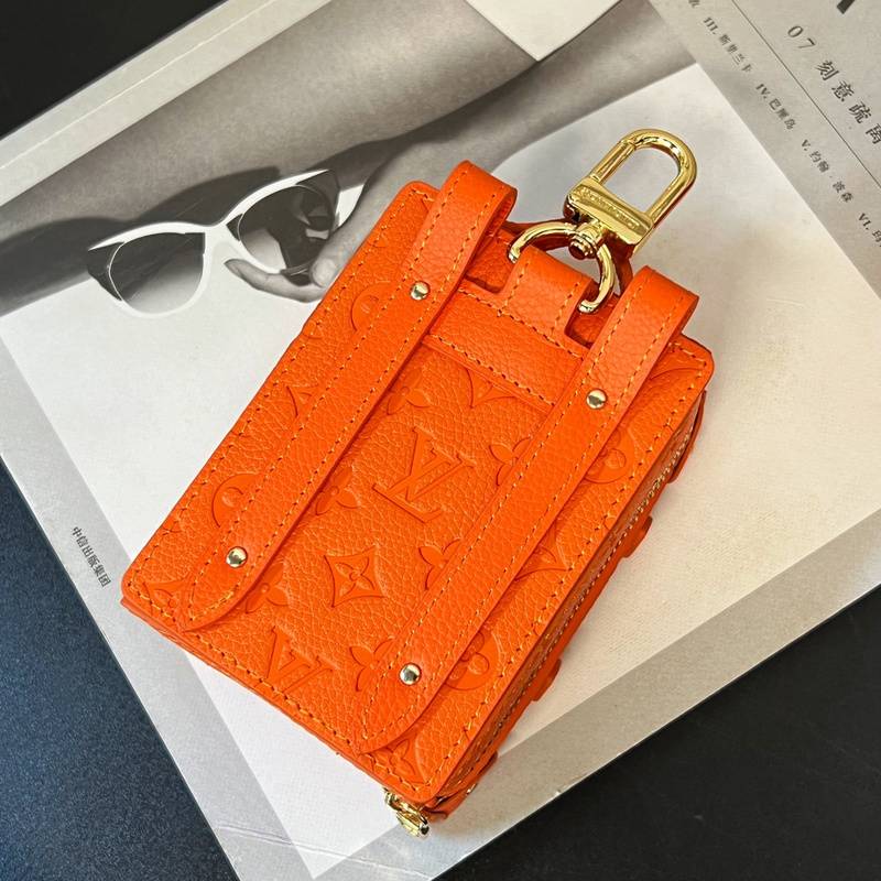 Orange Louis Vuitton Accessory - A Pop of Color