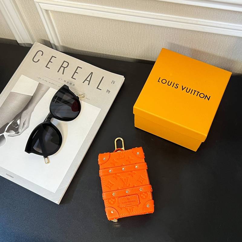 Orange Louis Vuitton Accessory - A Pop of Color