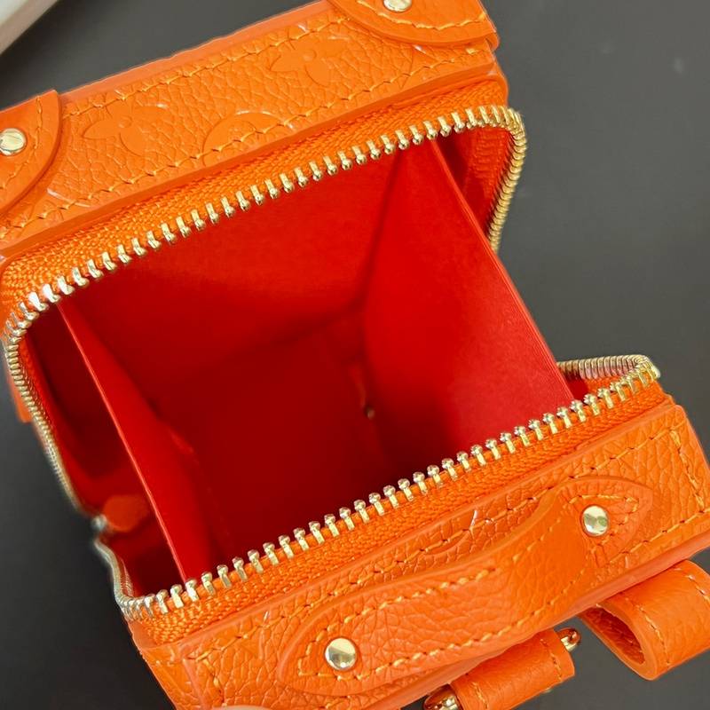 Orange Louis Vuitton Accessory - A Pop of Color