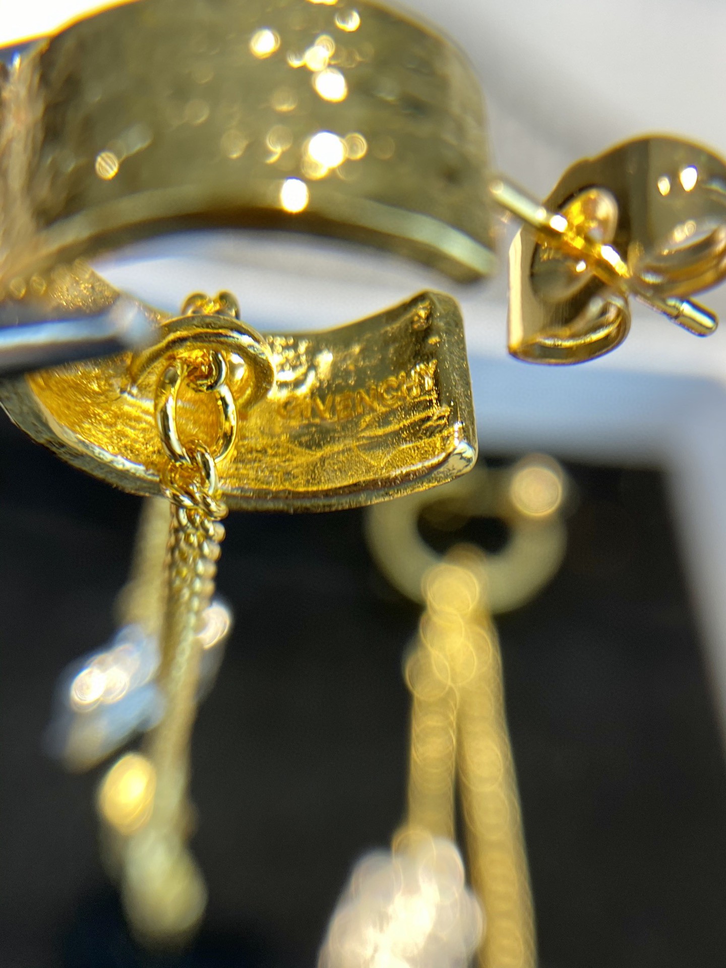 Givenchy Elegance: Gold Plated Logo Earrings - A Must-Have for Fashionistas