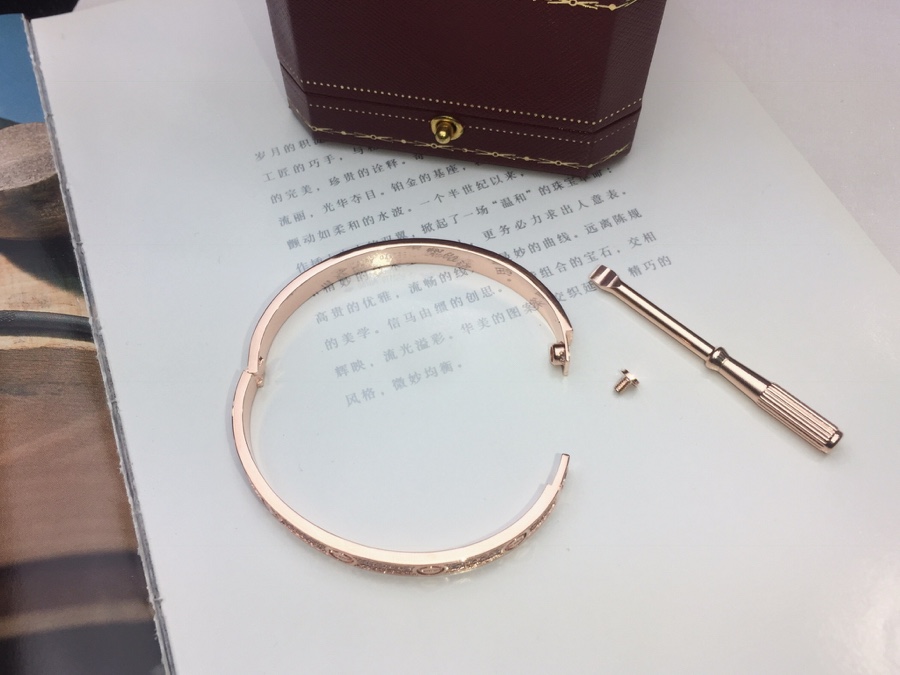 Elegant Rose Gold Cartier Bangle - Luxury Jewelry Must-Have