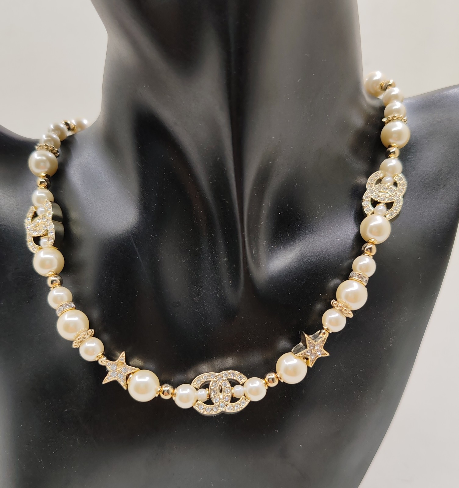 Chanel Pearl Necklace with Star and CC Charms - Timeless Elegance