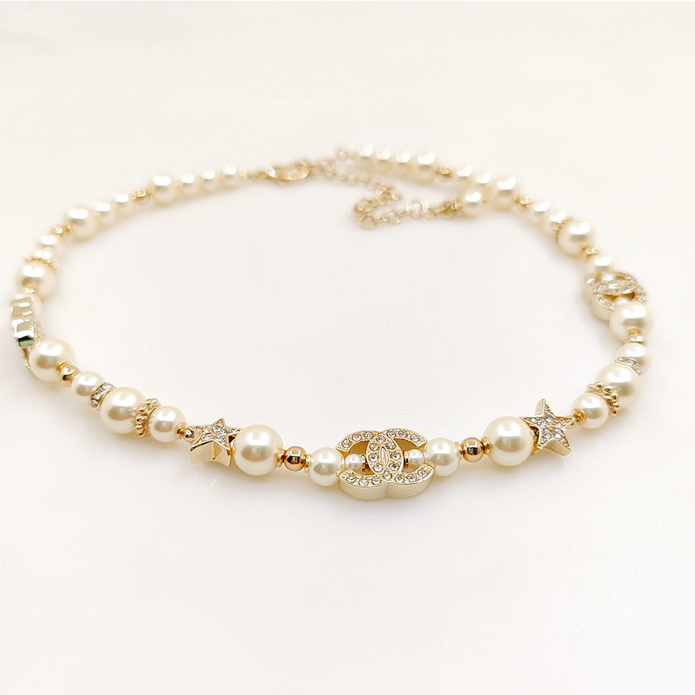 Chanel Pearl Necklace with Star and CC Charms - Timeless Elegance