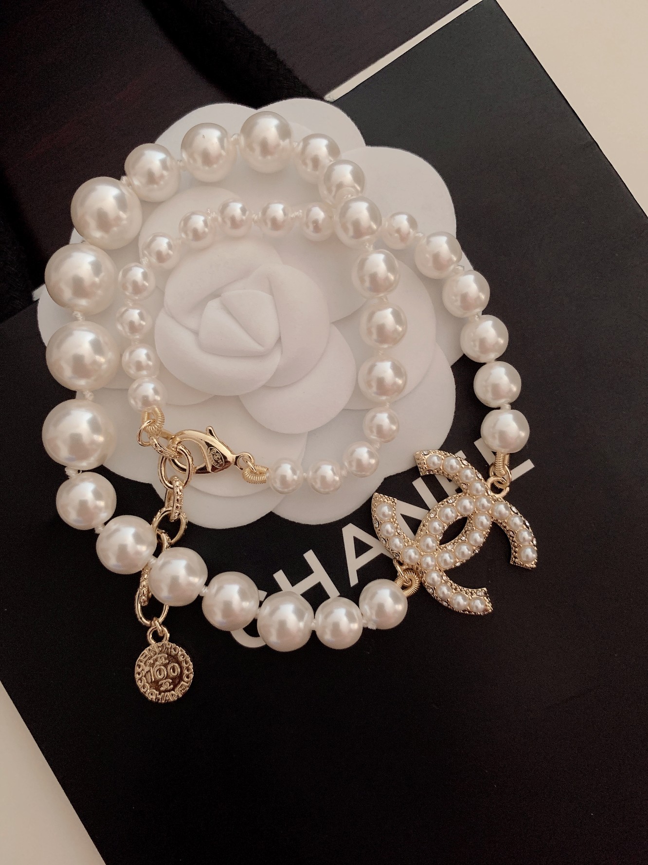 Chanel Pearl Necklace with CC Charm - Classic Elegance