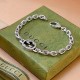 Gucci's Timeless Classic: Silver Chain Bracelet with Crystal Accents