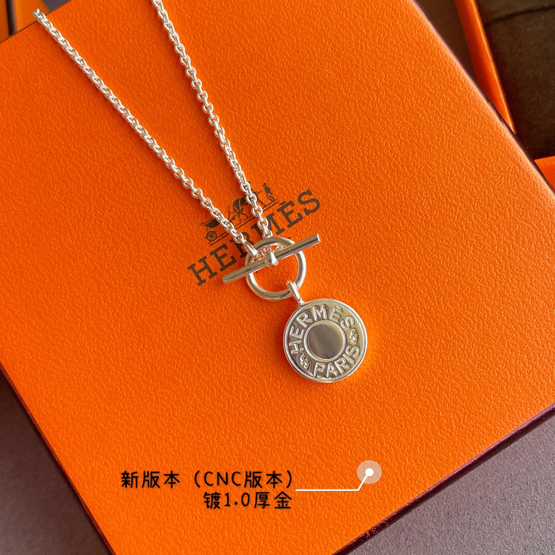 Hermès Elegance: Silver 'H' Disc Pendant Necklace