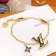 Trendy Gold Tone LV Necklace - Enamel Flower & Initial, Must-Have Accessory