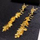 SaintLaurentEarrings - Gold Tone, Leaf Design, Fashion Statement