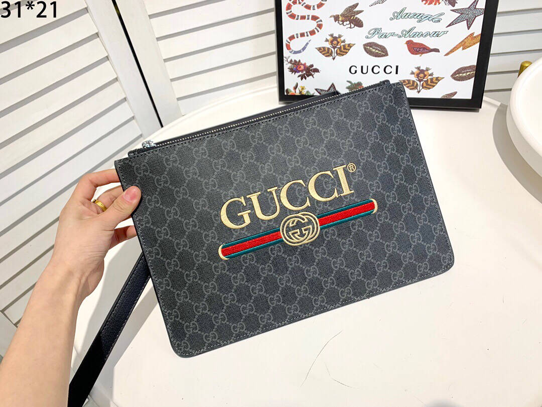 Gucci Signature Denim Pouch - Trendy & Classic