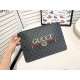 Gucci Signature Denim Pouch - Trendy & Classic