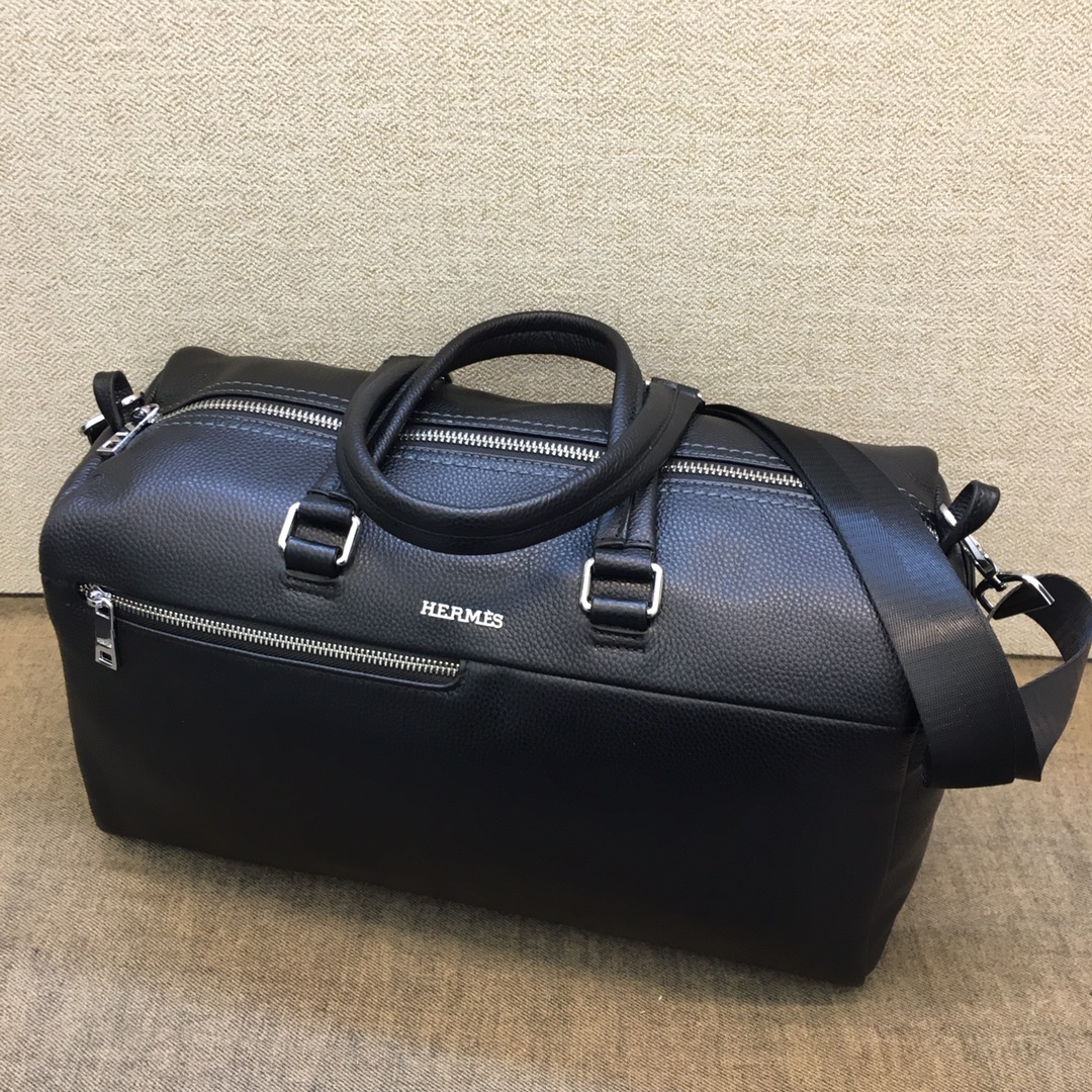 Hermès Black Leather Duffle Bag | Luxury Travel Essential |