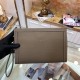 Hermès Taupe Leather Clutch | Elegant 'H' Buckle |